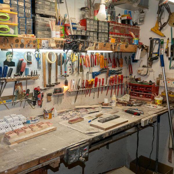 Home workshop with epoxy flooring by Epoxy Flooring Guys Melbourne. A tough surface built to handle and weekend projects.