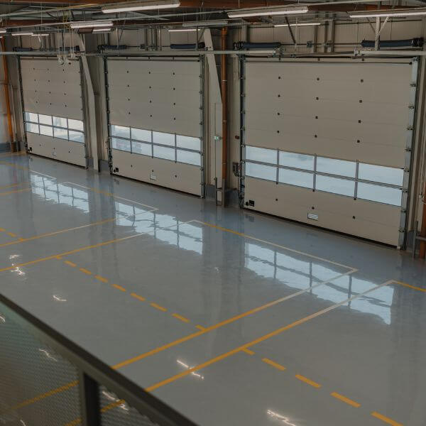 Mechanic workshop epoxy floor by Epoxy Flooring Guys Melbourne, easy to clean and stain resistant.