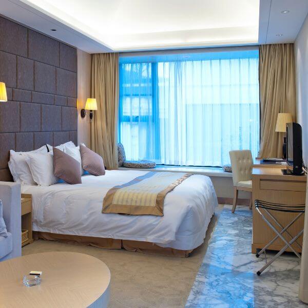 Modern bedroom with internal concrete floors finished in epoxy by Epoxy Flooring Guys Melbourne. Ideal for daily living.