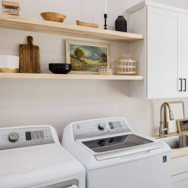 Modern laundry with epoxy flooring installed by Epoxy Flooring Guys Melbourne. Water-resistant and easy-clean surface.