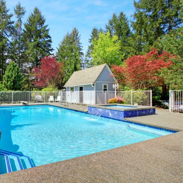Outdoor swimming pool with slip-resistant epoxy flooring by Epoxy Flooring Guys Melbourne. A safe, clean finish designed for splash zones.