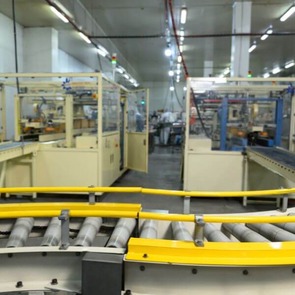 Packaging area epoxy flooring installed by Epoxy Flooring Guys Melbourne, designed to handle spills and foot traffic.
