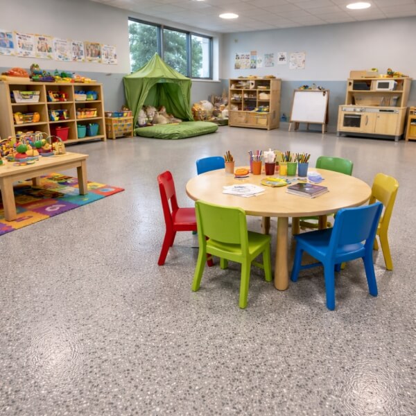 Childcare epoxy flooring Melbourne daycare room with durable, hygienic epoxy floor by Epoxy Flooring Guys Melbourne.