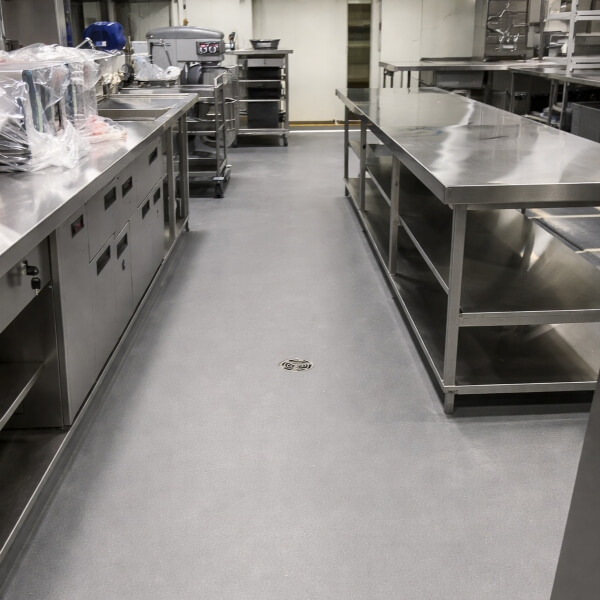 Commercial kitchen epoxy flooring in Melbourne with a durable epoxy floor designed for busy food prep areas by Epoxy Flooring Guys Melbourne.